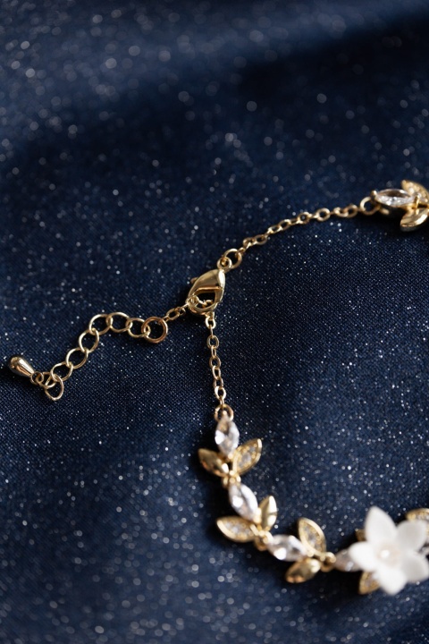 złota bransoletka ślubna z cyrkoniami i kwiatami glamour